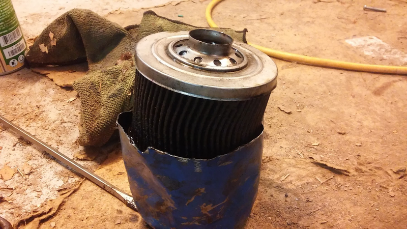 Illustration for article titled Incase anyone was wondering what an ACdelco oil filter looks like after 1500 miles (and other alfa musings)